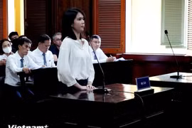 Bị cáo Trần Thị Ngọc Trinh hầu tòa. (Ảnh: Thành Chung/Vietnam+)