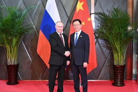 Phó Chủ tịch Trung Quốc Hàn Chính (Han Zheng) và Tổng thống Nga Vladimir Putin (Ảnh: Xinhua)