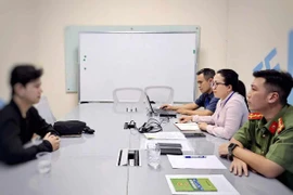 Cơ quan chức năng làm việc với Phạm Đức Tuấn. (Nguồn: Sở Thông tin Truyền thông TP.HCM)