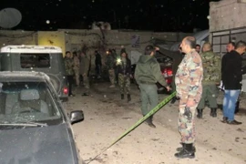 Lực lượng an ninh có mặt tại hiện trường vụ đánh bom. (Nguồn: AFP)