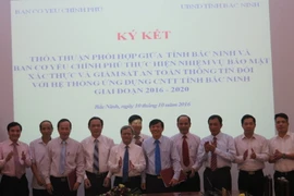 Lễ ký kết thỏa thuận. (Ảnh: Thái Hùng/TTXVN)