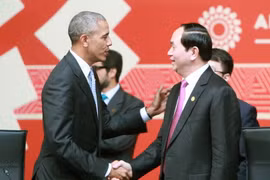 Chủ tịch nước Trần Đại Quang với Tổng thống Mỹ Barack Obama tại phiên khai mạc. (Ảnh: Nhan Sáng/TTXVN)