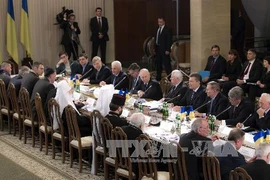 Quang cảnh cuộc đàm phán hôm 13/12 (Nguồn: TTXVN)