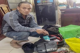 Đối tượng Nguyễn Trung Thành khi bị bắt. (Ảnh: TTXVN phát)