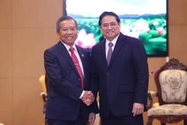 Thủ tướng Phạm Minh Chính tiếp Chủ tịch Trung ương Hội hữu nghị Lào-Việt Nam Boviengkham Vongdara. (Ảnh: Dương Giang/TTXVN)