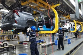 Dây chuyền sản xuất tại nhà máy lắp ráp ôtô Trường An ở Hợp Phì, tỉnh An Huy, Trung Quốc. (Ảnh: THX/TTXVN)