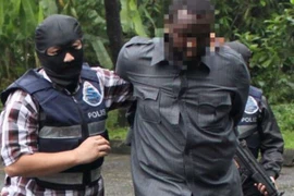 Cảnh sát Malaysia bắt giữ một nghi phạm khủng bố. Ảnh minh họa. (Nguồn: The Star)