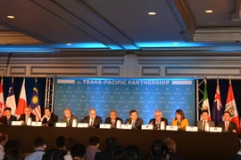 Đại diện 12 nước tham gia đàm phán trong cuộc họp báo công bố đạt được thỏa thuận lịch sử TPP, tại Atlanta, Mỹ ngày 5/10. (Nguồn: THX/TTXVN)