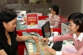 Giá vàng SJC tăng lên sát 36 triệu đồng nhờ lực đẩy từ thế giới