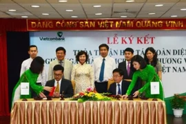 Lãnh đạo hai bên tham gia ký kết. (Nguồn: Vietcombank)