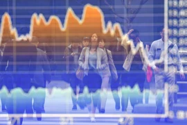 Bảng điện tử niêm yết chỉ số chứng khoán ở Tokyo, Nhật Bản. (Nguồn: AFP/TTXVN)
