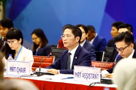 Bộ Trưởng Bộ Công thương Trần Tuấn Anh phát biểu tại hội nghị. (Ảnh: An Đăng/TTXVN)