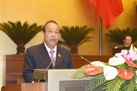 Phó Thủ tướng Thường trực Chính phủ Trương Hòa Bình trình bày Báo cáo. (Ảnh: Doãn Tấn/TTXVN)