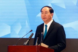 Chủ tịch nước Trần Đại Quang đến dự và phát biểu. (Ảnh: Văn Điệp/TTXVN) 