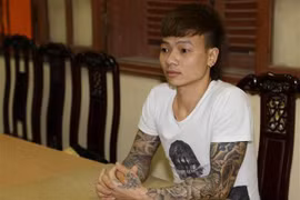 Đối tượng Ngô Bá Khá khi bị bắt. (Ảnh: Thanh Thương/TTXVN)