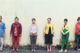 Các đối tượng tại cơ quan Công an. (Ảnh: TTXVN phát)