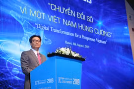 Phó Thủ tướng Vũ Đức Đam tại Diễn đàn ICT Summit 2019. (Ảnh: Minh Sơn/Vietnam+)
