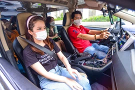 Gojek chính thức ra mắt dịch vụ xe công nghệ 7 chỗ GoCar XL Protect tại TP.Hồ Chí Minh và Hà Nội vào đầu tháng Năm và thu hút rất nhiều sự quan tâm của người dùng. (Ảnh: T.U/Vietnam+)