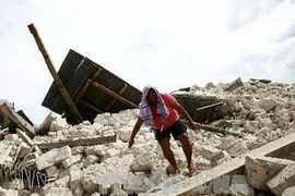 Cảnh đổ nát ở Bohol sau trận động đất ngày 16/10 vừa qua. (Ảnh: THX/TTXVN)