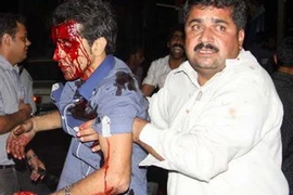 Các nạn nhân tại hiện trường vụ đánh bom. (Ảnh: AFP/TTXVN)