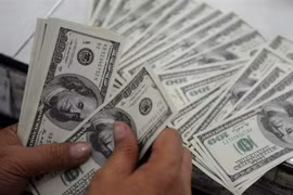 Đồng USD. (Ảnh: AFP/TTXVN)