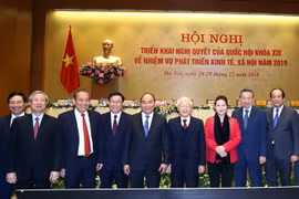 Tổng Bí thư, Chủ tịch nước Nguyễn Phú Trọng, Thủ tướng Nguyễn Xuân Phúc, Chủ tịch Quốc Hội Nguyễn Thi Kim Ngân và các đại biểu. (Ảnh: Thống Nhất/TTXVN)