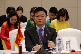 Bộ trưởng Tư pháp Lê Thành Long tại hội nghị. (Ảnh: Phạm Kiên/TTXVN)