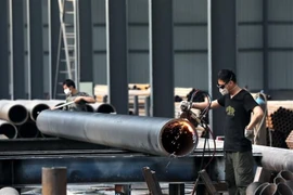 Sản xuất thép cuộn tại tỉnh An Huy, Trung Quốc ngày 3/5 vừa qua. (Ảnh: AFP/TTXVN)