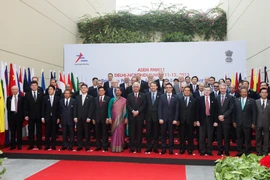 Các đại biểu chụp ảnh tại hội nghị. (Nguồn: THX/TTXVN)