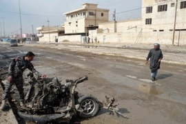 Hiện trường một vụ đánh bom xe ở Baquba, tháng 2/2013. (Nguồn: AFP) 