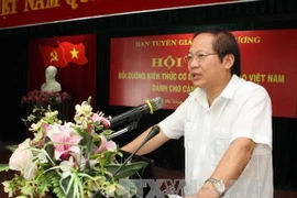 Ông Trương Minh Tuấn, Phó Trưởng Ban Tuyên giáo Trung ương phát biểu. (Ảnh: Trần Lê Lâm/TTXVN)