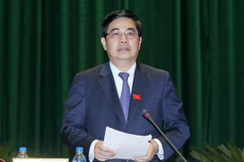 Bộ trưởng Bộ Nông nghiệp và Phát triển nông thôn Cao Đức Phát trả lời chất vấn. (Ảnh: Nhan Sáng/TTXVN)