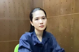 Ngọc Trinh tại cơ quan điều tra. (Ảnh: Công an cung cấp)