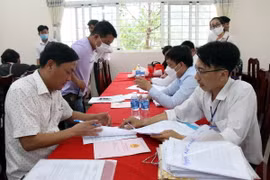 Công tác chi trả tiền bối thường giải phóng mặt bằng dự án Vành đai 3 được thực hiện từ đầu tháng 5/2023. (Ảnh: Tiến Lực/TTXVN)