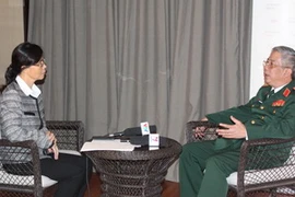 Thượng tướng Nguyễn Chí Vịnh trả lời phỏng vấn. (Ảnh: Kim Yến/Vietnam+)
