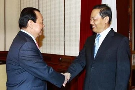 Bí thư Thành ủy TP.HCM Lê Thanh Hải tiếp ông Bành Thanh Hoa, Bí thư Khu ủy Khu tự trị dân tộc Choang. (Ảnh: Doãn Tấn/TTXVN)