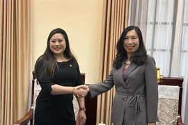 Ngày 13/11, tại Hà Nội, Thứ trưởng Bộ Ngoại giao Lê Thị Thu Hằng tiếp bà Caroline Phạm, Ủy viên Ủy ban Giao dịch Hàng hóa Tương lai Hoa Kỳ. (Ảnh TTXVN phát)