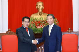 Trưởng Ban Kinh tế Trung ương Trần Tuấn Anh tiếp Tổng Bí thư Đảng Cộng sản Peru Luis Alberto Villanueva Carbajal. (Ảnh: Phương Hoa/TTXVN)