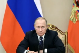 Tổng thống Nga Vladimir Putin phát biểu trong một cuộc họp ở thủ đô Moskva. (Nguồn: AFP/TTXVN)