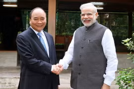Thủ tướng Nguyễn Xuân Phúc và Thủ tướng Ấn Độ Narendra Modi tại Khu di tích Phủ Chủ tịch. (Ảnh: Thống Nhất/TTXVN)