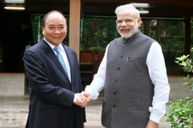 Thủ tướng Nguyễn Xuân Phúc và Thủ tướng Ấn Độ Narendra Modi tại Khu di tích Phủ Chủ tịch. (Ảnh: Thống Nhất/TTXVN)