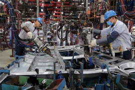 Xưởng hàn khung xe ôtô tại Công ty TNHH Ford Việt Nam, tỉnh Hải Dương. (Ảnh: Trần Việt/TTXVN)