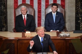 Tổng thống Mỹ Donald Trump (phía trước) đọc thông điệp liên bang tại Quốc hội ở Washington, DC ngày 30/1/2018. (Nguồn: AFP/TTXVN)