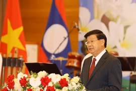 Tổng Bí thư, Chủ tịch nước Lào Thongloun Sisoulith đọc Diễn văn đáp từ. (Ảnh: Trí Dũng/TTXVN)