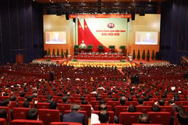 Đại hội nghe đồng chí Nguyễn Phú Trọng, Tổng Bí thư Ban Chấp hành Trung ương Đảng, Chủ tịch nước CHXHCN Việt Nam đọc Báo cáo chính trị của Ban Chấp hành Trung ương Đảng khóa XII và các văn kiện trình Đại hội. (Ảnh: TTXVN)