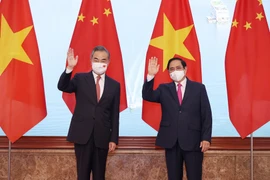Thủ tướng Phạm Minh Chính tiếp Bộ trưởng Ngoại giao Trung Quốc Vương Nghị. (Ảnh: Dương Giang/TTXVN)	