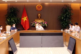 Phó Thủ tướng Chính phủ Vũ Đức Đam chủ trì cuộc họp. (Ảnh: Phạm Kiên/TTXVN)