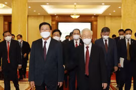 Tổng Bí thư Nguyễn Phú Trọng đón Tổng Bí thư, Chủ tịch nước Lào Thongloun Sisoulith. (Ảnh: Trí Dũng/TTXVN)
