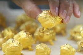 Giá vàng thế giới chạm mức cao nhất trong hơn một tuần