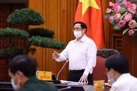 Thủ tướng Phạm Minh Chính yêu cầu thực hiện nghiêm túc các biện pháp phòng, chống dịch trong các khu công nghiệp. (Ảnh: Dương Giang/TTXVN)